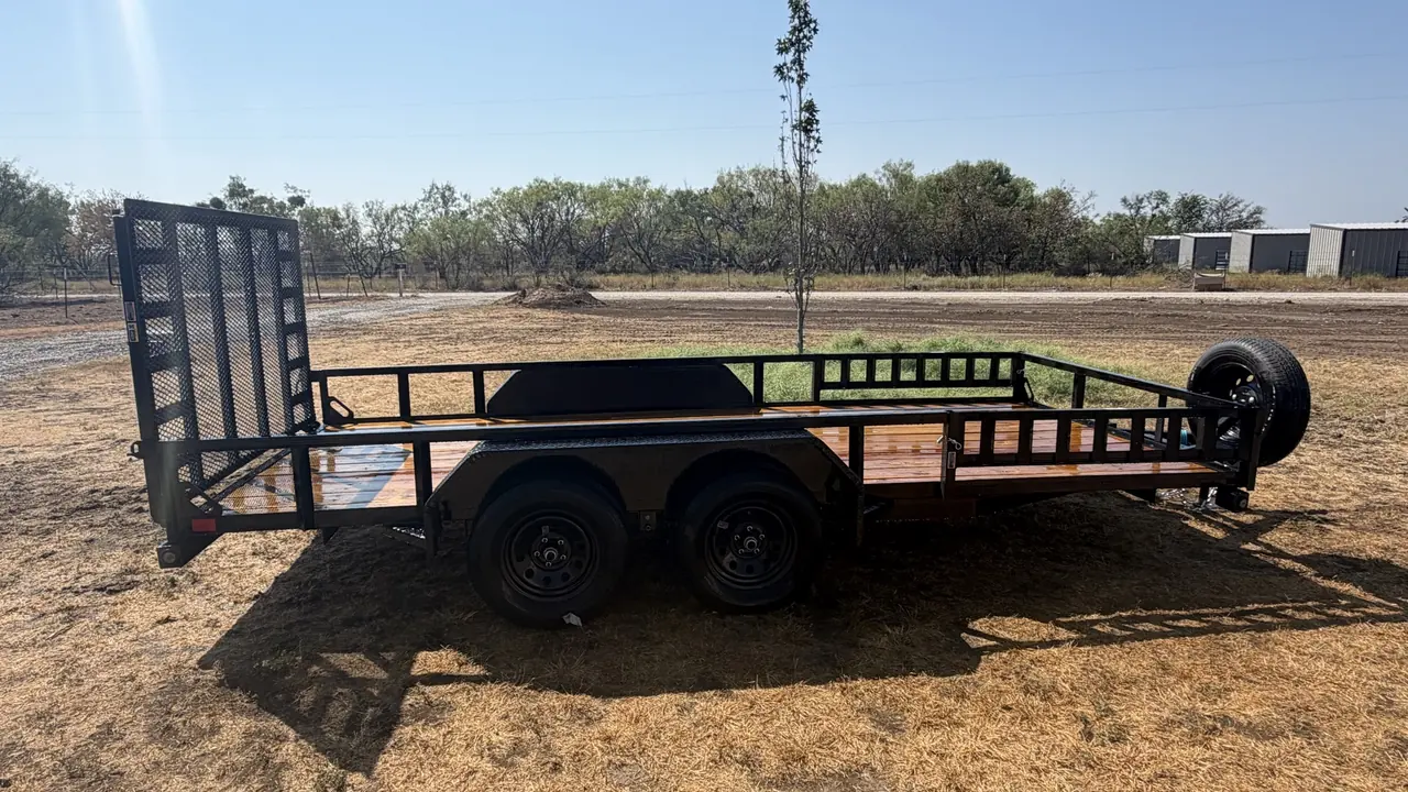 APEX 16' Utility &middot; Unit 2 trailer — side profile on the yard.
